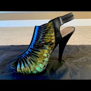 Excellent condition (hardly worn) Fergie heels size 7.5